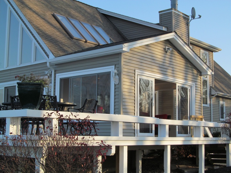 Sunroom exterior with deck