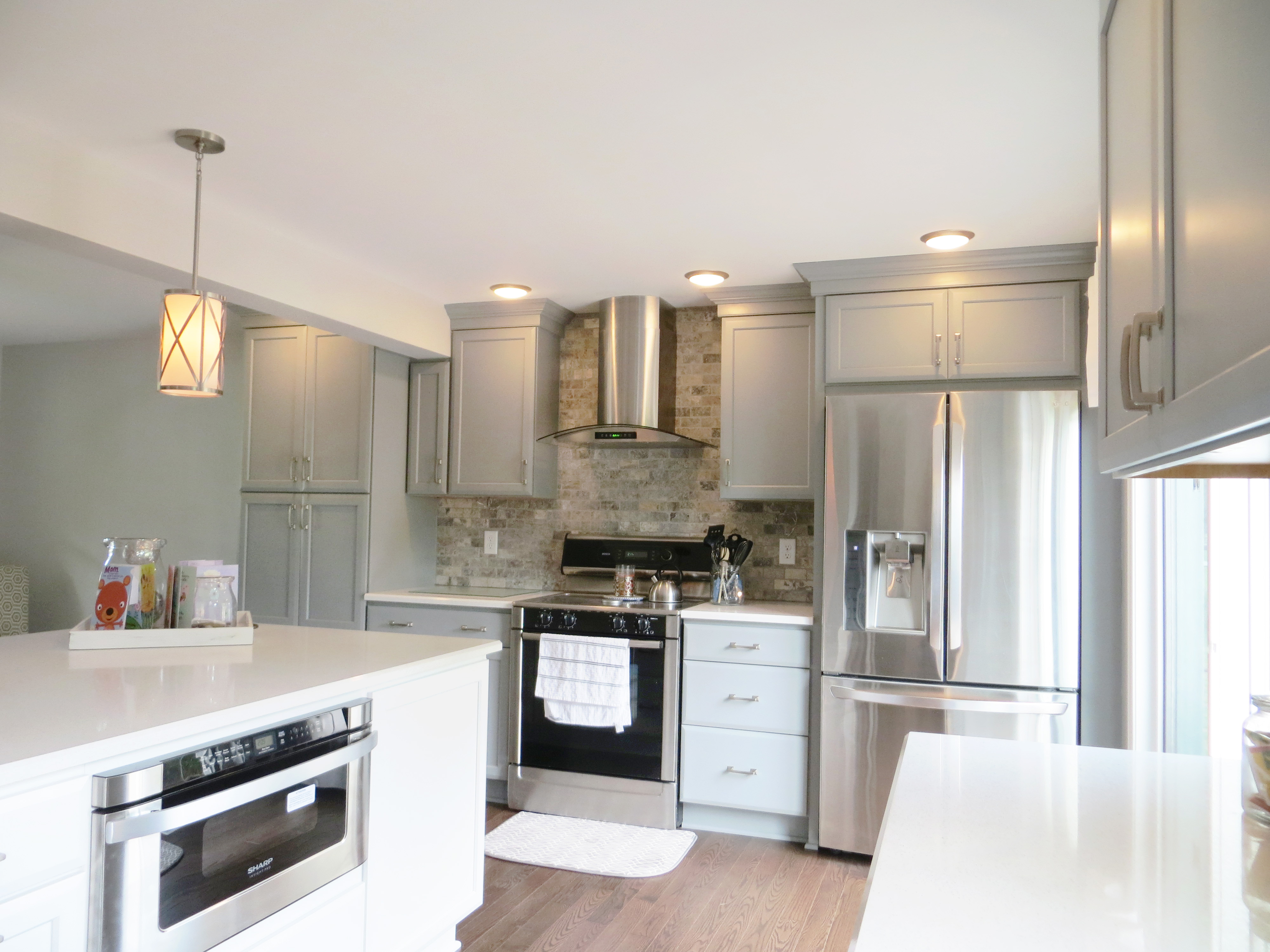 Remodeled kitchen with island oven