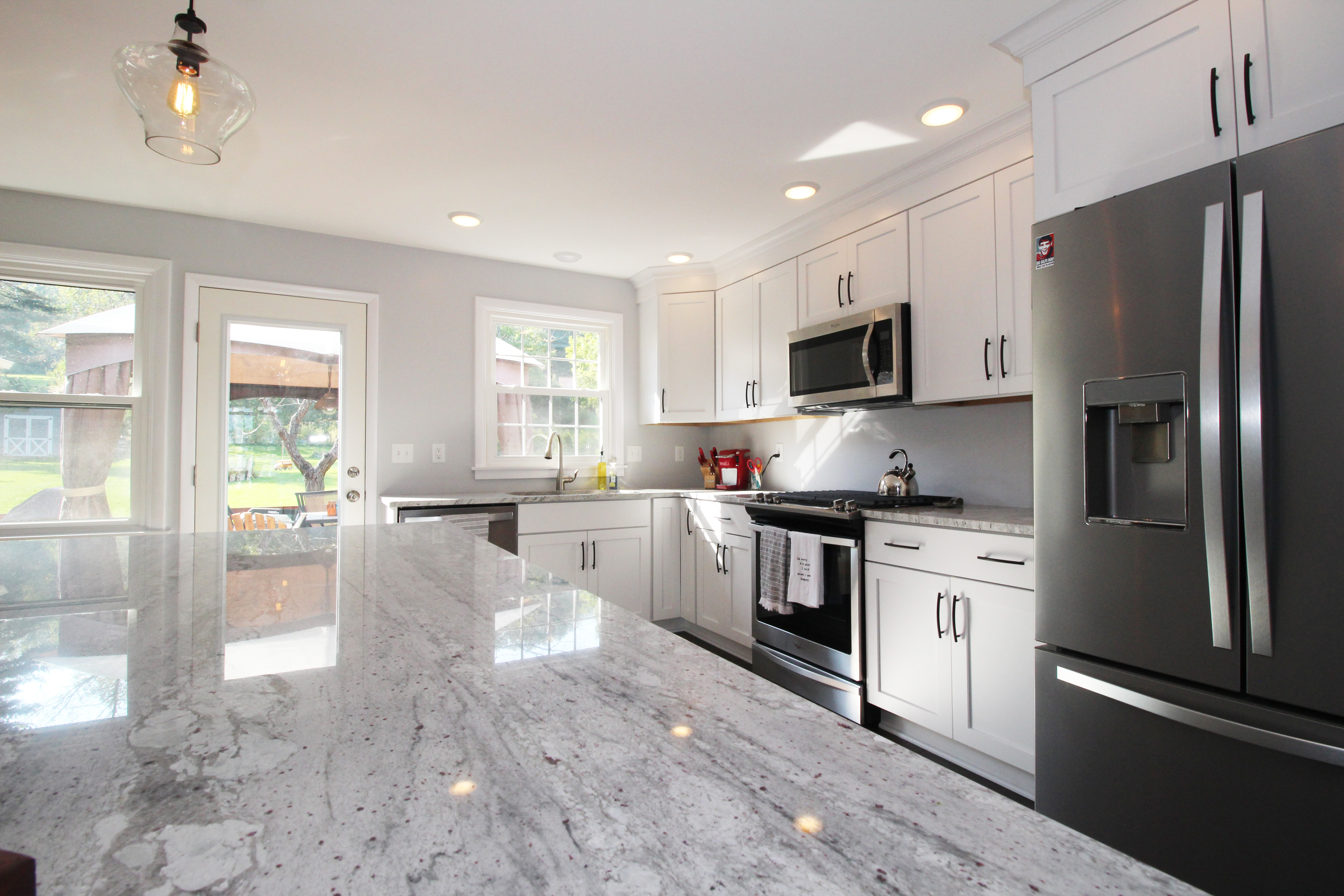 Remodeled kitchen with granite countertops