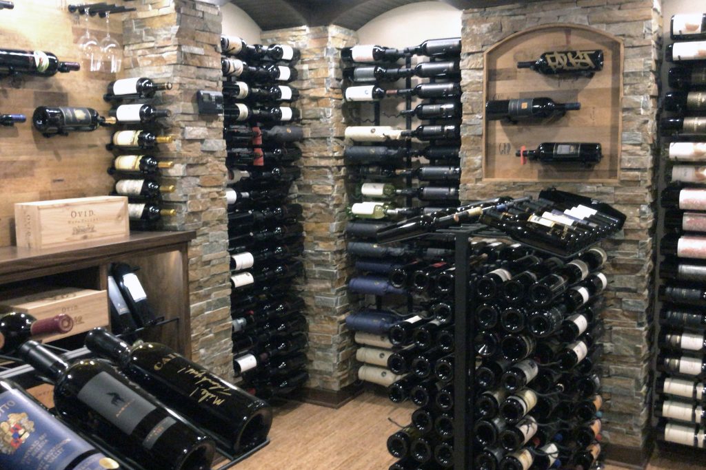 Wine cellar loaded with bottles of wine