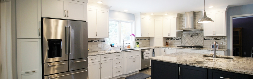 Remodeled kitchen with island sink